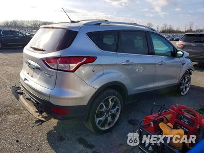 Trzecie zdjęcie samochodu z tyłu: 2016 FORD ESCAPE TITANIUM VIN:1FMCU9J90GUC04704 - miniatura