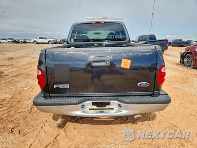 Zdjęcie 6 z 12 samochodu: 2000 FORD F150 VIN:1FTRX07W8YKB32257 - miniatura
