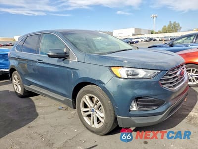 Czwarte zdjęcie samochodu z boku: 2019 FORD EDGE SEL VIN:2FMPK4J92KBC38331 - miniatura
