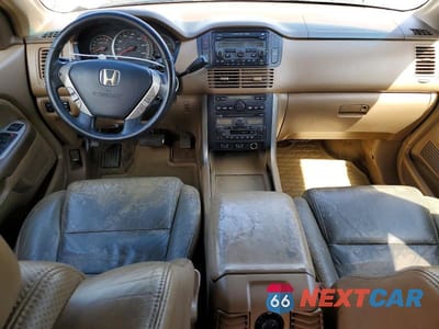 Zdjęcie 8 z 12 samochodu: 2005 HONDA PILOT EXL VIN:2HKYF18705H529046 - miniatura