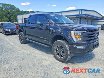 Czwarte zdjęcie samochodu z boku: 2021 FORD F150 SUPERCREW VIN:1FTFW1ED5MFB43412 - miniatura