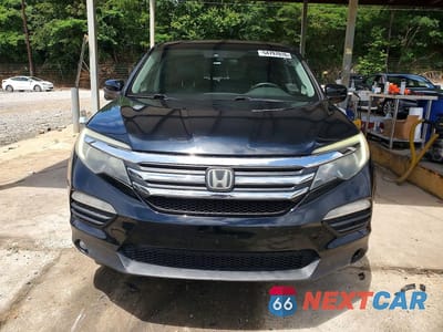 Piąte zdjęcie samochodu w środku: 2016 HONDA PILOT EX VIN:5FNYF5H49GB024458 - miniatura