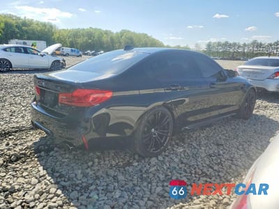 Trzecie zdjęcie samochodu z tyłu: 2019 BMW M5 VIN:WBSJF0C58KB285914 - miniatura