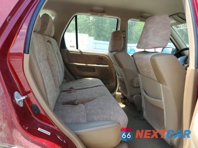 Zdjęcie 11 z 13 samochodu: 2004 HONDA CR-V LX VIN:JHLRD684X4C022603 - miniatura