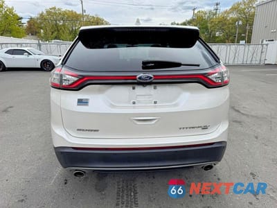 Piąte zdjęcie samochodu w środku: 2018 FORD EDGE TITANIUM VIN:2FMPK4K86JBB66540 - miniatura