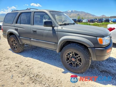 Czwarte zdjęcie samochodu z boku: 1998 TOYOTA 4RUNNER LIMITED VIN:JT3GN87R3W0063822 - miniatura