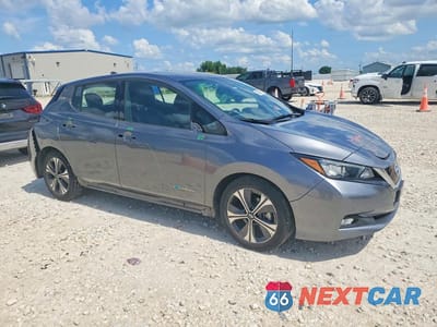 Czwarte zdjęcie samochodu z boku: 2018 NISSAN LEAF SL VIN:1N4AZ1CPXJC307738 - miniatura