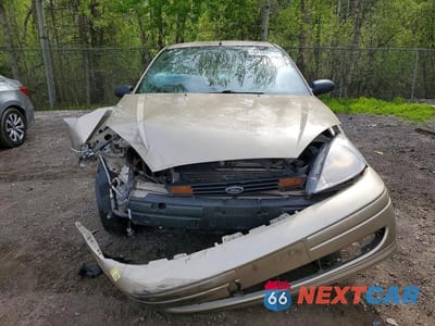 Piąte zdjęcie samochodu w środku: 2000 FORD FOCUS SE VIN:1FAFP34P9YW409160 - miniatura