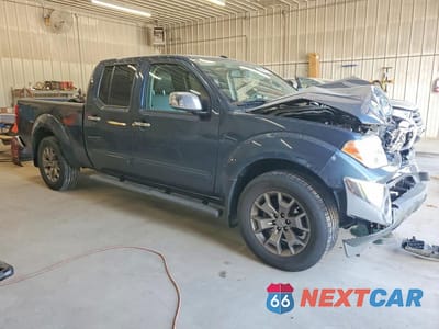 Czwarte zdjęcie samochodu z boku: 2014 NISSAN FRONTIER SL VIN:1N6AD0FV5EN729212 - miniatura