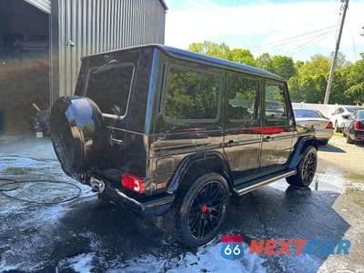 Czwarte zdjęcie samochodu z boku: 2015 MERCEDES-BENZ G 550 VIN:WDCYC3HF9FX239464 - miniatura