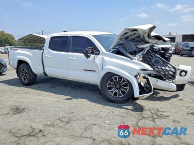 Czwarte zdjęcie samochodu z boku: 2023 TOYOTA TACOMA TRD SPORT VIN:3TMDZ5BN6PM158864 - miniatura