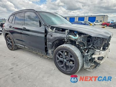 Czwarte zdjęcie samochodu z boku: 2021 BMW X3 SDRIVE30I VIN:5UXTY3C02M9F26359 - miniatura