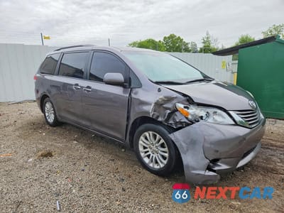 Czwarte zdjęcie samochodu z boku: 2014 TOYOTA SIENNA XLE 8-PASSENGER VIN:5TDYK3DC2ES466830 - miniatura