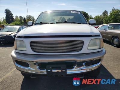Piąte zdjęcie samochodu w środku: 1997 FORD F150 VIN:1FTDX18W6VKD21340 - miniatura