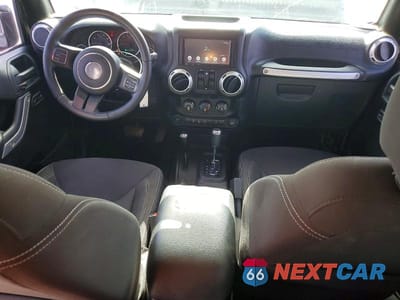 Zdjęcie 8 z 14 samochodu: 2016 JEEP WRANGLER UNLIMITED SAHARA VIN:1C4BJWEG1GL283693 - miniatura