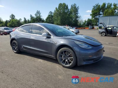 Czwarte zdjęcie samochodu z boku: 2019 TESLA MODEL 3 VIN:5YJ3E1EA5KF312129 - miniatura