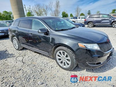 Czwarte zdjęcie samochodu z boku: 2014 LINCOLN MKT VIN:2LMHJ5AT5EBL53863 - miniatura