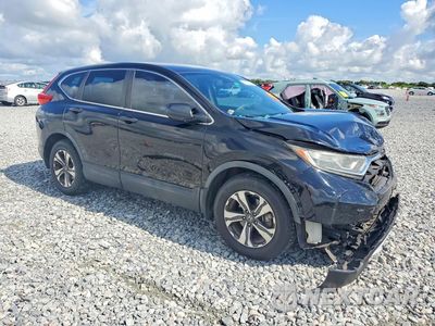 Czwarte zdjęcie samochodu z boku: 2017 HONDA CR-V LX VIN:7FARW5H36HE011121 - miniatura