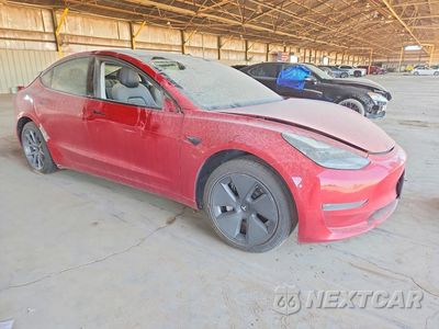 Czwarte zdjęcie samochodu z boku: 2023 TESLA MODEL 3 VIN:5YJ3E1EA5PF449644 - miniatura