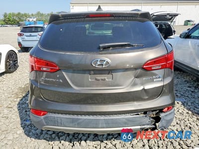 Zdjęcie 6 z 12 samochodu: 2013 HYUNDAI SANTA FE SPORT 2.0T VIN:5XYZUDLA3DG046686 - miniatura