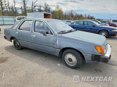 Czwarte zdjęcie samochodu z boku: 1984 FORD TEMPO GL VIN:2FABP22RXEB201668 - miniatura