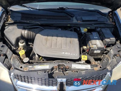 Zdjęcie 12 z 14 samochodu: 2012 DODGE GRAND CARAVAN SXT VIN:2C4RDGCG9CR402879 - miniatura