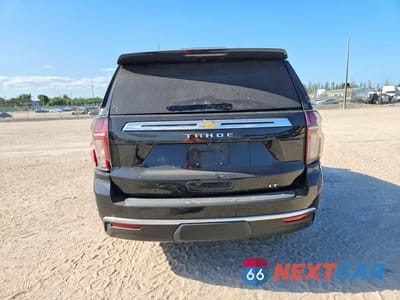 Zdjęcie 6 z 12 samochodu: 2021 CHEVROLET TAHOE C1500 LT VIN:1GNSCNKDXMR407104 - miniatura