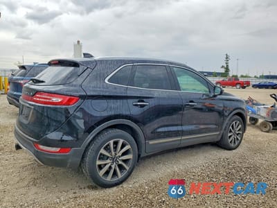 Trzecie zdjęcie samochodu z tyłu: 2019 LINCOLN MKC RESERVE VIN:5LMCJ3D92KUL19182 - miniatura