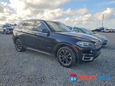 Czwarte zdjęcie samochodu z boku: 2018 BMW X5 XDRIVE35I VIN:5UXKR0C52J0X99477 - miniatura