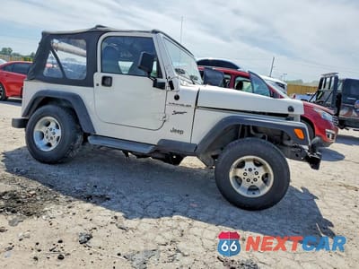 Czwarte zdjęcie samochodu z boku: 2002 JEEP WRANGLER / TJ SPORT VIN:1J4FA49S92P755378 - miniatura