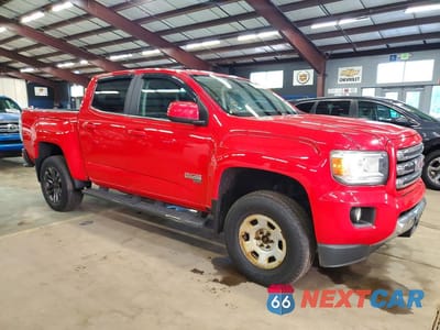 Czwarte zdjęcie samochodu z boku: 2015 GMC CANYON SLE VIN:1GTG6BE34F1180730 - miniatura