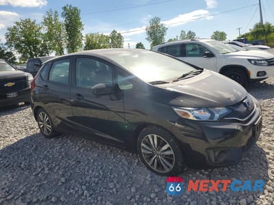 Czwarte zdjęcie samochodu z boku: 2015 HONDA FIT EX VIN:3HGGK5H87FM702503 - miniatura