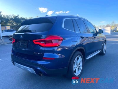 Czwarte zdjęcie samochodu z boku: 2021 BMW X3 XDRIVE30E VIN:5UXTS1C08M9F18949 - miniatura