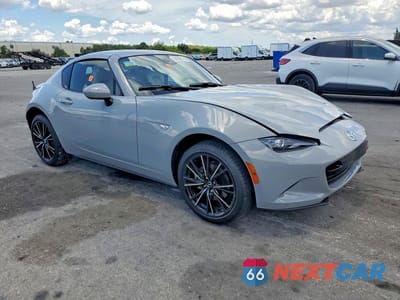 Czwarte zdjęcie samochodu z boku: 2024 MAZDA MX-5 MIATA GRAND TOURING VIN:JM1NDAM71R0602541 - miniatura