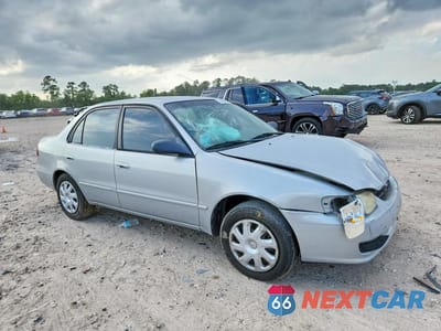 Czwarte zdjęcie samochodu z boku: 2001 TOYOTA COROLLA LE VIN:1NXBR12E51Z542648 - miniatura