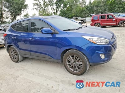 Czwarte zdjęcie samochodu z boku: 2014 HYUNDAI TUCSON SE VIN:KM8JU3AG7EU886710 - miniatura