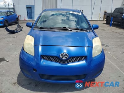 Piąte zdjęcie samochodu w środku: 2009 TOYOTA YARIS BASE VIN:JTDKT903895260581 - miniatura
