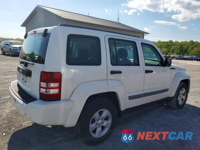 Trzecie zdjęcie samochodu z tyłu: 2010 JEEP LIBERTY SPORT VIN:1J4PN2GK5AW133025 - miniatura