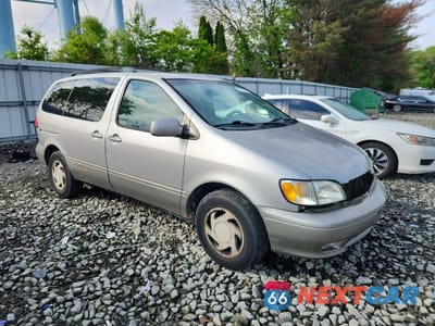 Czwarte zdjęcie samochodu z boku: 2001 TOYOTA SIENNA CE VIN:4T3ZF13C71U409529 - miniatura