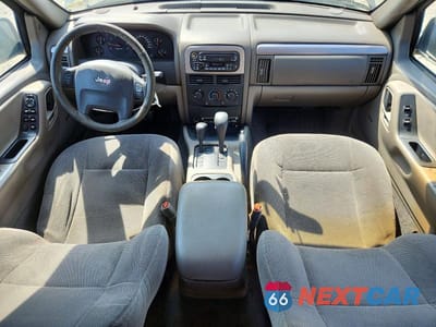 Zdjęcie 8 z 13 samochodu: 2001 JEEP GRAND CHEROKEE LAREDO VIN:1J4GW48S51C607774 - miniatura