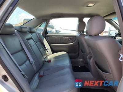 Zdjęcie 10 z 12 samochodu: 2002 TOYOTA AVALON XL VIN:4T1BF28B62U260211 - miniatura