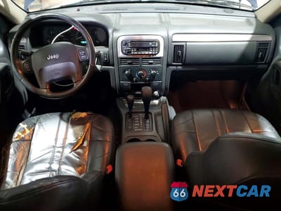 Zdjęcie 8 z 13 samochodu: 2003 JEEP GRAND CHEROKEE LAREDO VIN:1J4GW48S53C570261 - miniatura