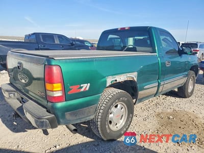 Trzecie zdjęcie samochodu z tyłu: 1999 GMC NEW SIERRA K1500 VIN:1GTEK14T4XZ517799 - miniatura