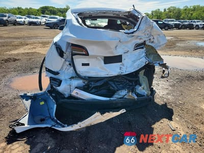Zdjęcie 6 z 12 samochodu: 2022 TESLA MODEL Y VIN:7SAYGDEE7NF364440 - miniatura