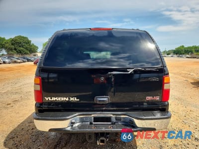 Zdjęcie 6 z 13 samochodu: 2002 GMC YUKON XL C1500 VIN:3GKEC16Z52G293180 - miniatura