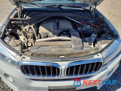Zdjęcie 12 z 13 samochodu: 2014 BMW X5 SDRIVE35I VIN:5UXKR2C52E0H31314 - miniatura
