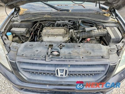 Zdjęcie 12 z 13 samochodu: 2004 HONDA PILOT EXL VIN:2HKYF18614H505070 - miniatura