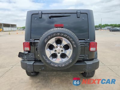 Zdjęcie 6 z 12 samochodu: 2017 JEEP WRANGLER UNLIMITED SAHARA VIN:1C4BJWEG3HL696314 - miniatura