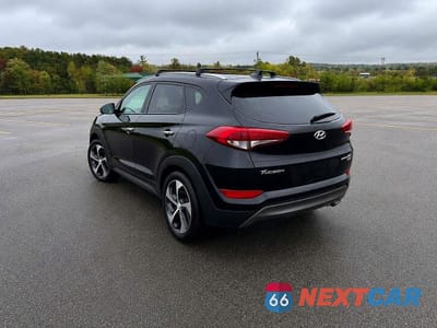 Trzecie zdjęcie samochodu z tyłu: 2016 HYUNDAI TUCSON LIMITED VIN:KM8J3CA25GU130626 - miniatura