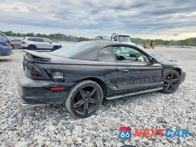 Trzecie zdjęcie samochodu z tyłu: 1998 FORD MUSTANG GT VIN:1FAFP42X9WF254776 - miniatura